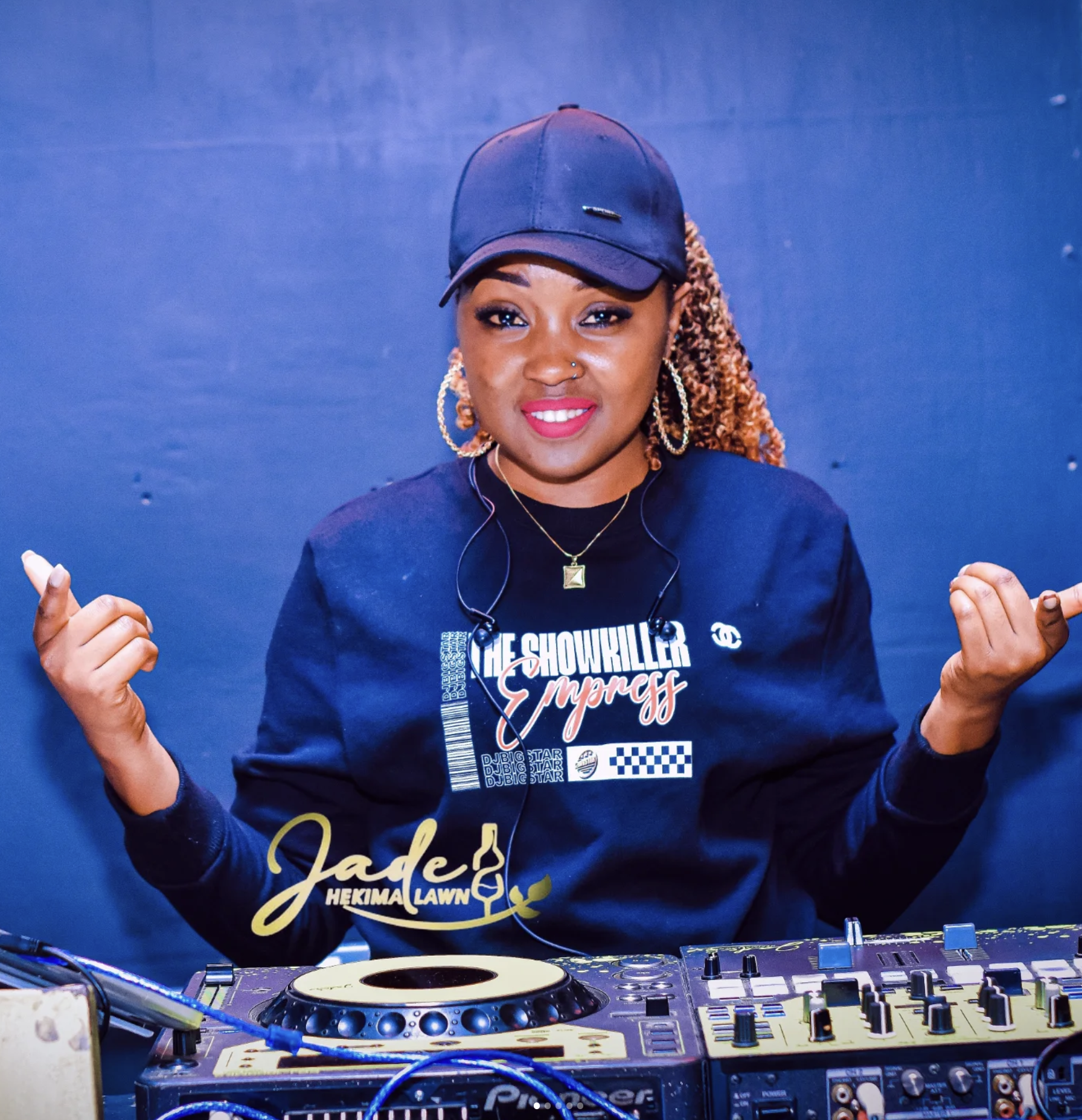 DJ BigStar performing behind a DJ controller.
